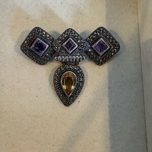 Elegant Silver and Purple Brooch